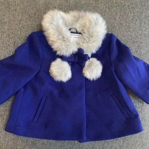 Blue fur coat bow